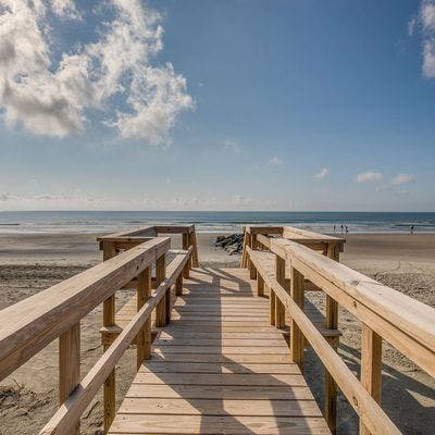 Private boardwalk to the beach at a Folly Beach vacation rental.