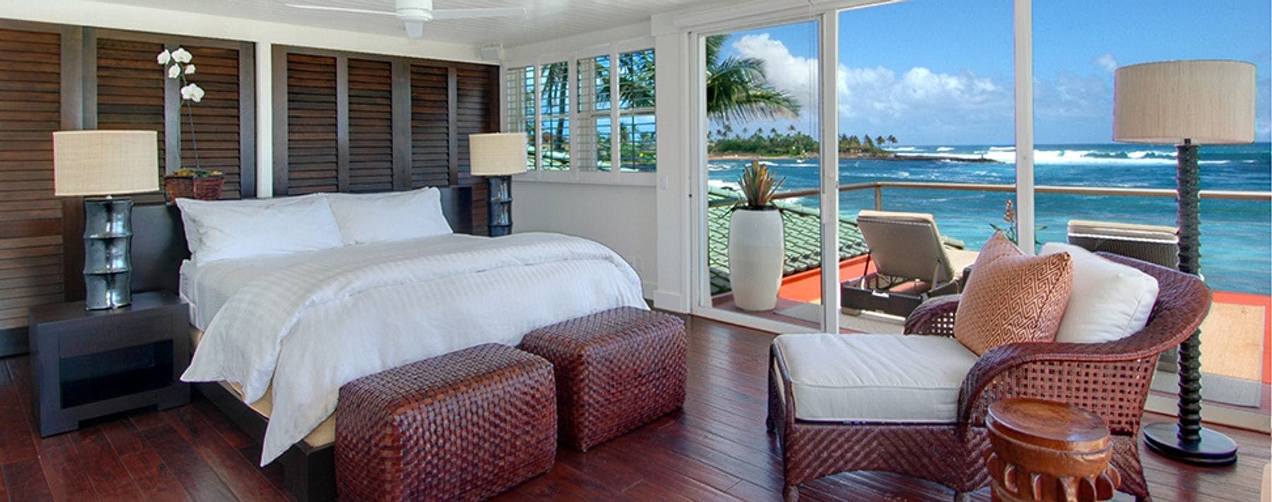 Primary bedroom with ocean views from Kauai vacation rental home
