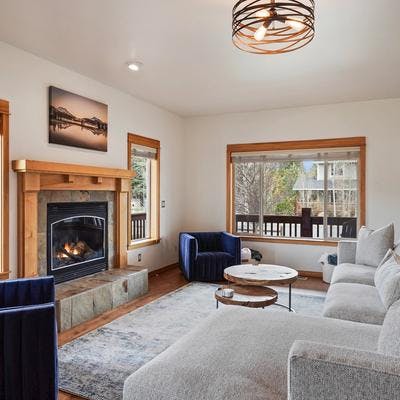 Living room with a fireplace in a Bend, OR vacation rental.