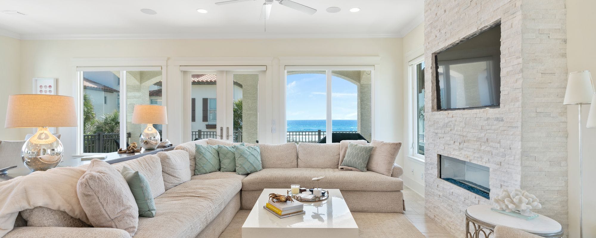 Coastal chic living space in a vacation rental managed by Scenic Stays.