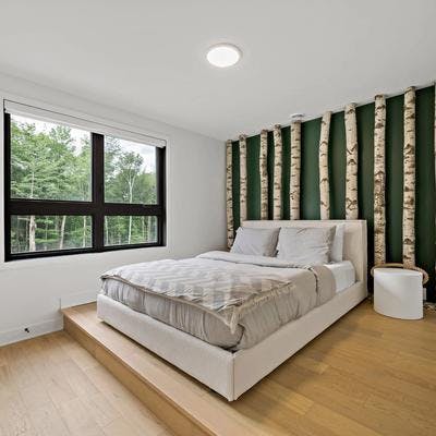Bedroom with birch wall