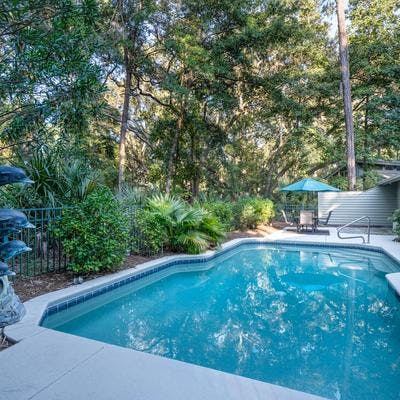 Exterior view of a private pool at a Hilton Head Island vacation rental.