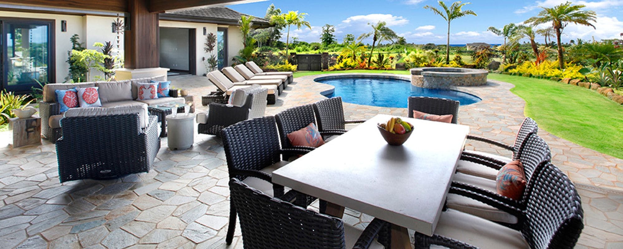 Outdoor living space with private pool at Kauai vacation rental