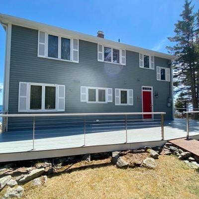 Exterior view of an oceanfront Maine vacation rental.