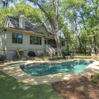 Exterior view of a Hilton Head Island vacation rental with a private pool.