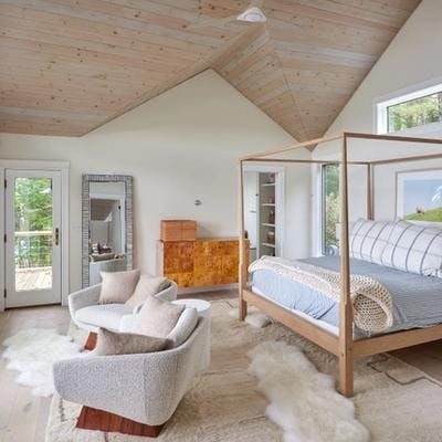 Primary bedroom in a Maine vacation rental.