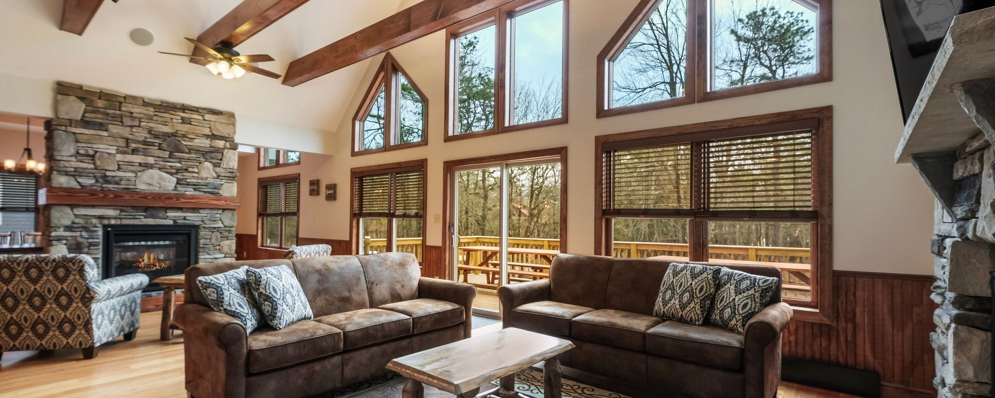 Living room with views by Pocono Mountain Rentals