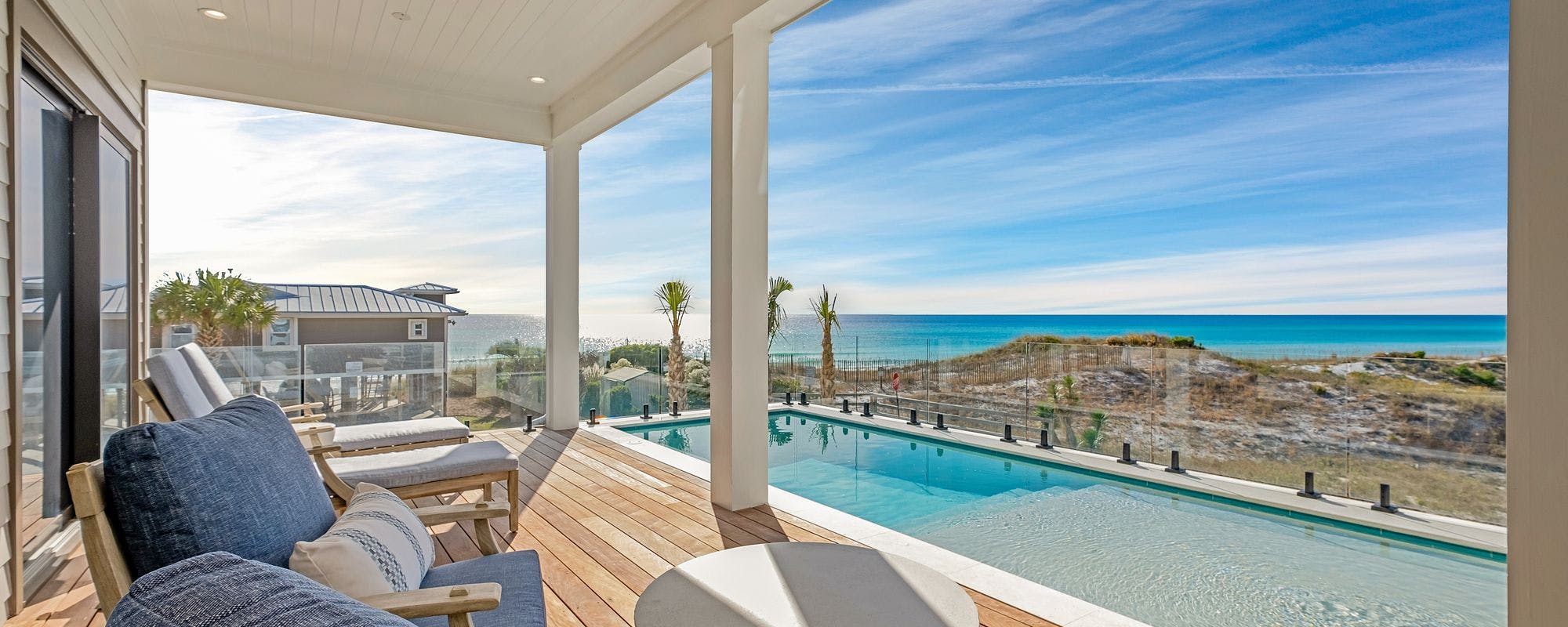 Porch overlooking pool and Gulf of Mexico