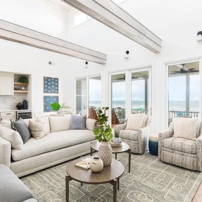 Living room with a view in a Folly Beach vacation rental.