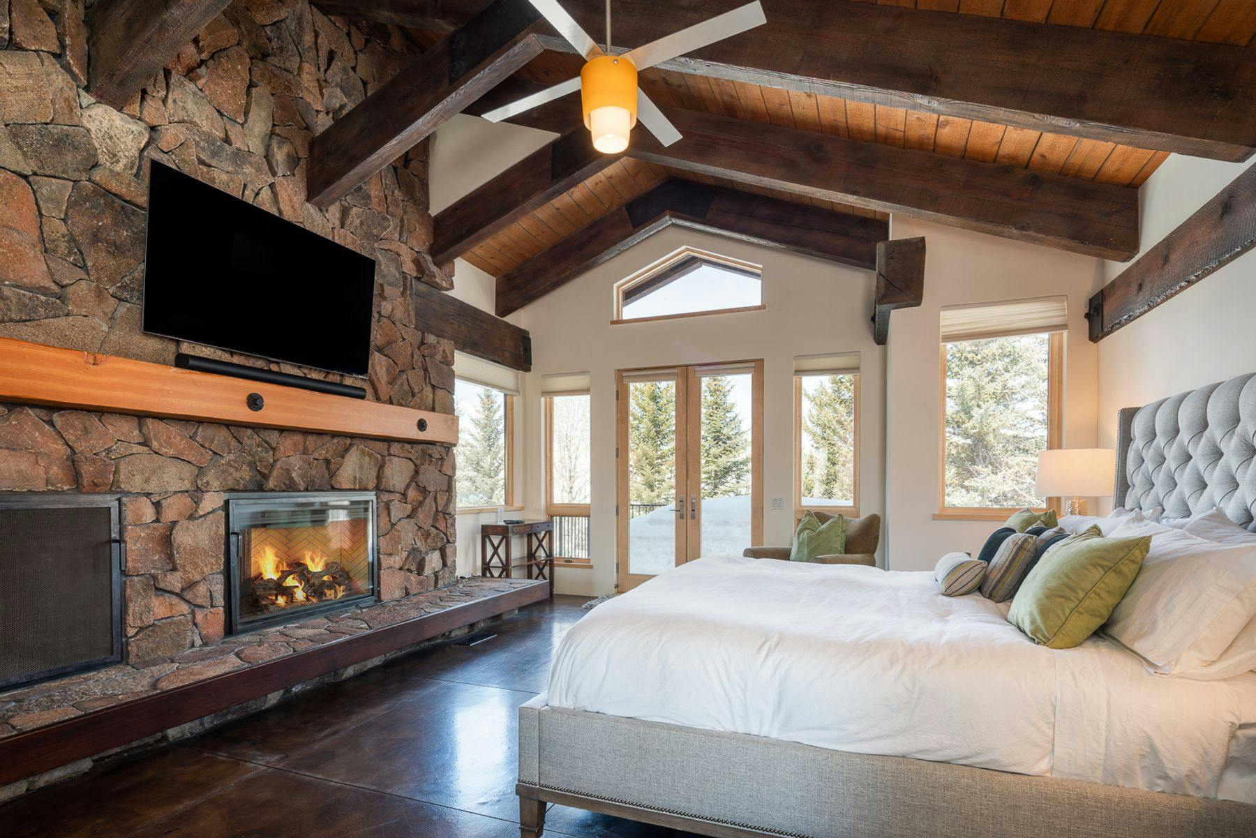 Bedroom in Sun Valley vacation home with fireplace and views