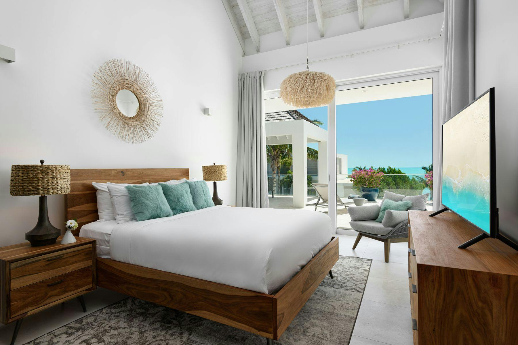 Primary bedroom with a view in a Turks and Caicos vacation rental.