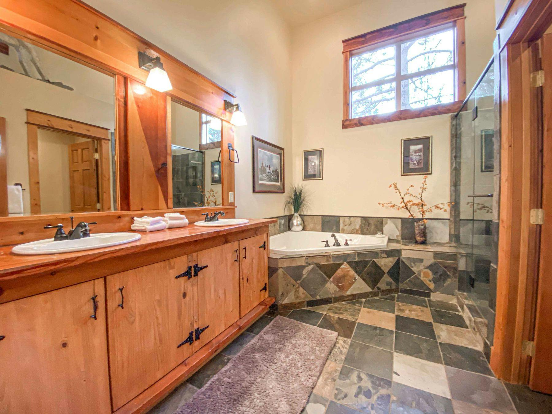 Spacious modern bathroom in a Cascara Vacation Rentals home.
