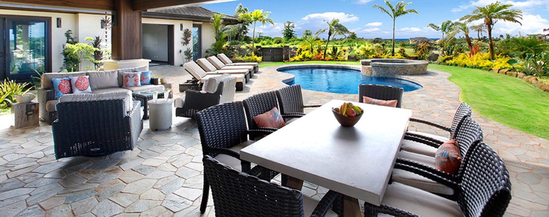 Outdoor living space with private pool at Kauai vacation rental